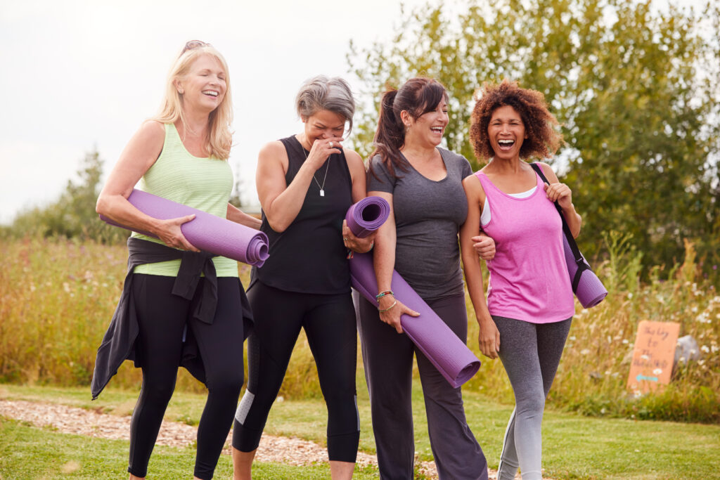 Diverse group of women navigating the phases of menopause together.