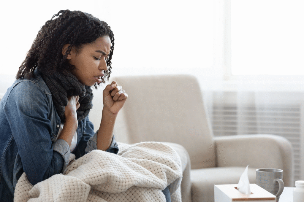 A sick person in need of a natural treatment for pneumonia to support lung health and recovery.